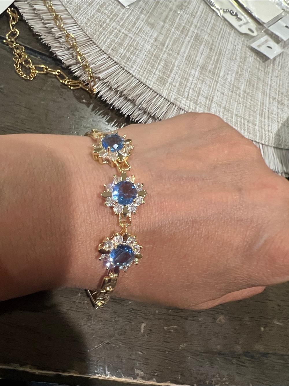 Elegant Gold Bracelet with Blue Crystal Flower Accents